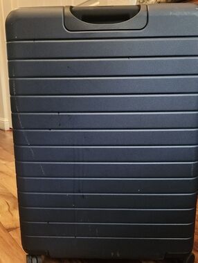 AWAY The Large Flex.  Used once with minor scratches from being checked.